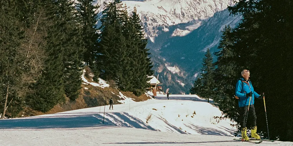 St Gervais Skier in front of mountain